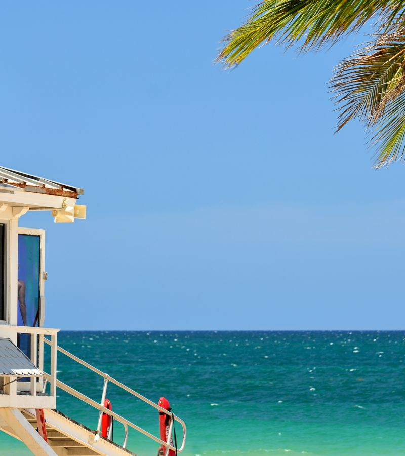A lifeguard station on the beach with a view of the ocean